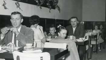 Photo of diners inside the Peacock Inn circa 1950s