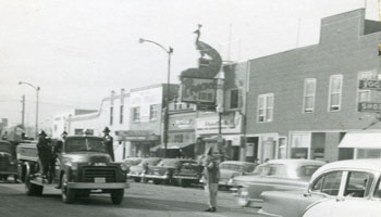 Streetscape with Peacock Inn building circa 1960s