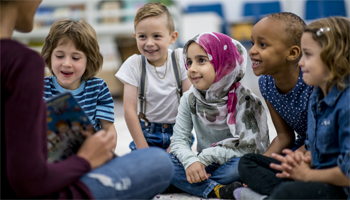 group of diverse children demonstrating inclusion