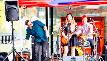 Photo of band playing at the Ross Street Patio