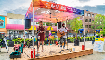 A band plays live music on the Ross Street Patio in downtown Red Deer