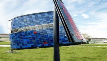 Side view of a rectangle sculpture made up of glass tiles an the photo etched tiles of old photographs.