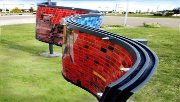 Top view of a rectangle sculpture made up of glass tiles an the photo etched tiles.