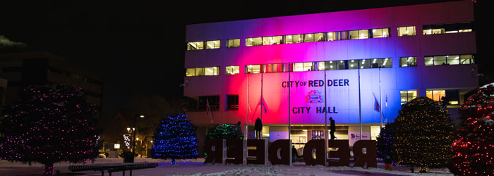 City Hall lit up with coloured lights