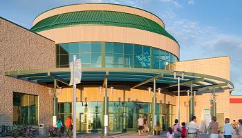 A family walking into the Collicutt Centre