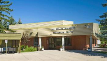 Outside view of the front doors of the Roland Michener Recreation Centre.